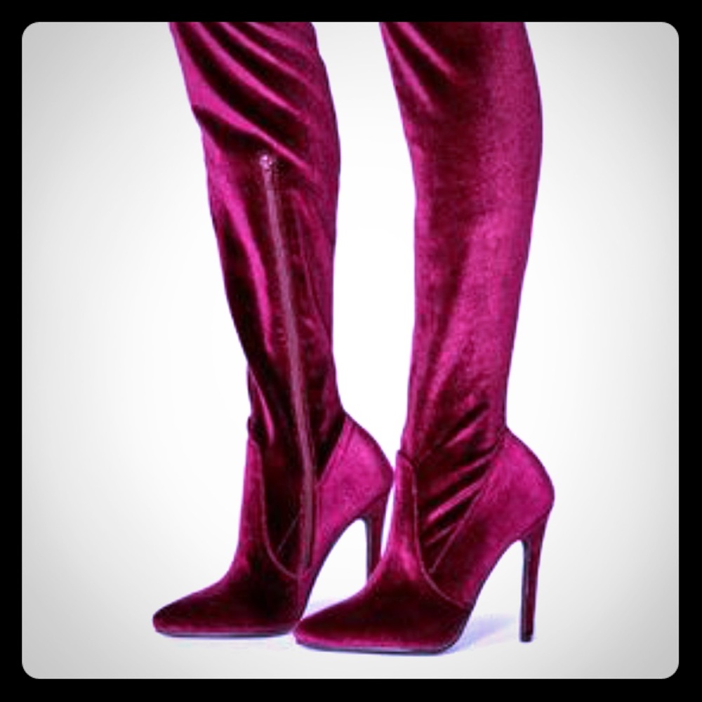 Thigh high stiletto boots.